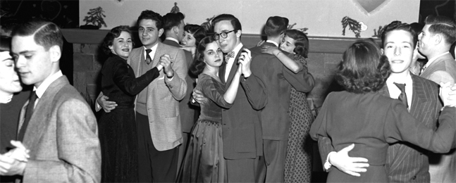 EMBRACEABLE: Dancing at a Valentine's Day charity fundraiser, 1951.